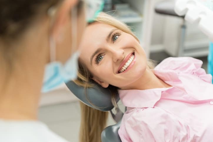 happy woman at dentist