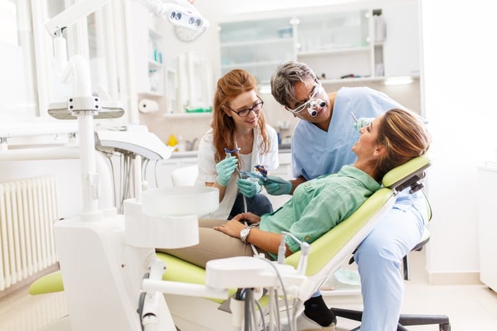 Happy People At The Dentist